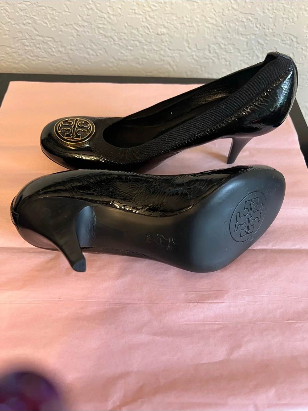 Tory Burch Black Patent Logo Round-Toe Pumps with Gold Emblem